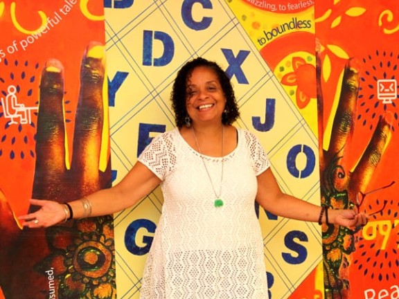 Ife Nii Owoo unveils "Ready: A Pathway for Hope" at the re-opening of Logan Library